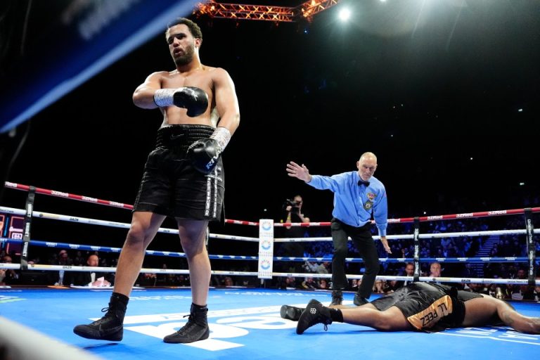 Moses Itauma celebrates after stopping Jermaine Franklin in their heavyweight bout in Manchester