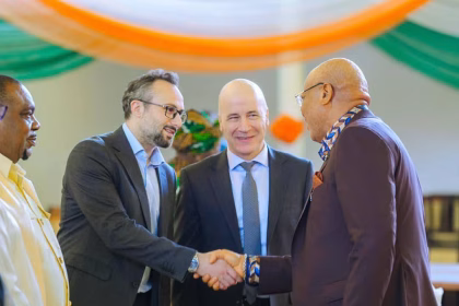 Governor Umo Eno receiving the Ibom Deep Seaport feasibility and progress report in Uyo