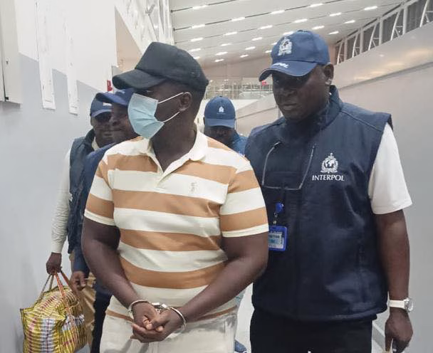 Nigeria Police officers during the extradition of Matthew Chukwuemeka Adebiyi to the United Kingdom in Lagos
