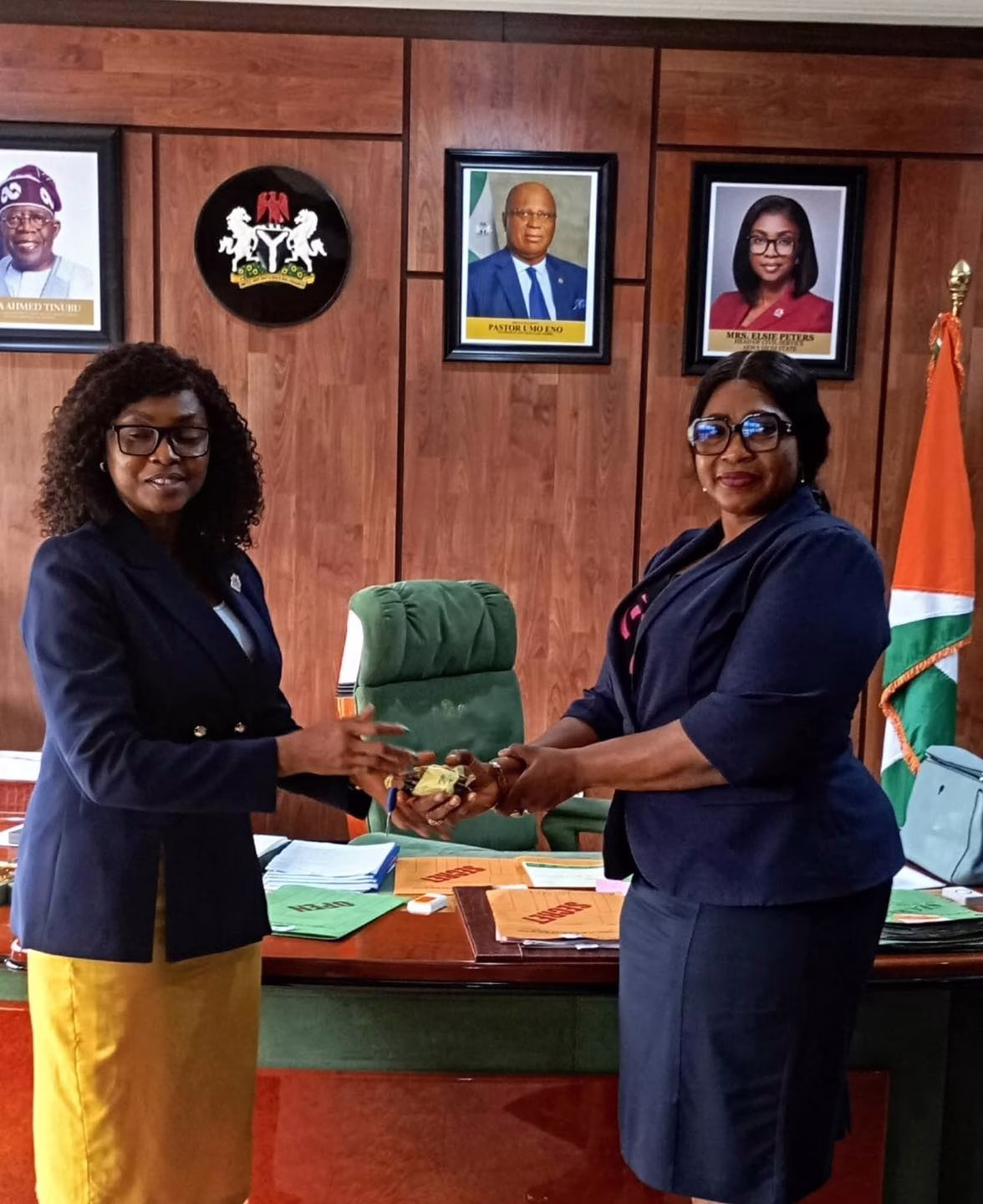 Akwa Ibom public servants receiving keys to newly built two-bedroom bungalows at a housing allocation ceremony