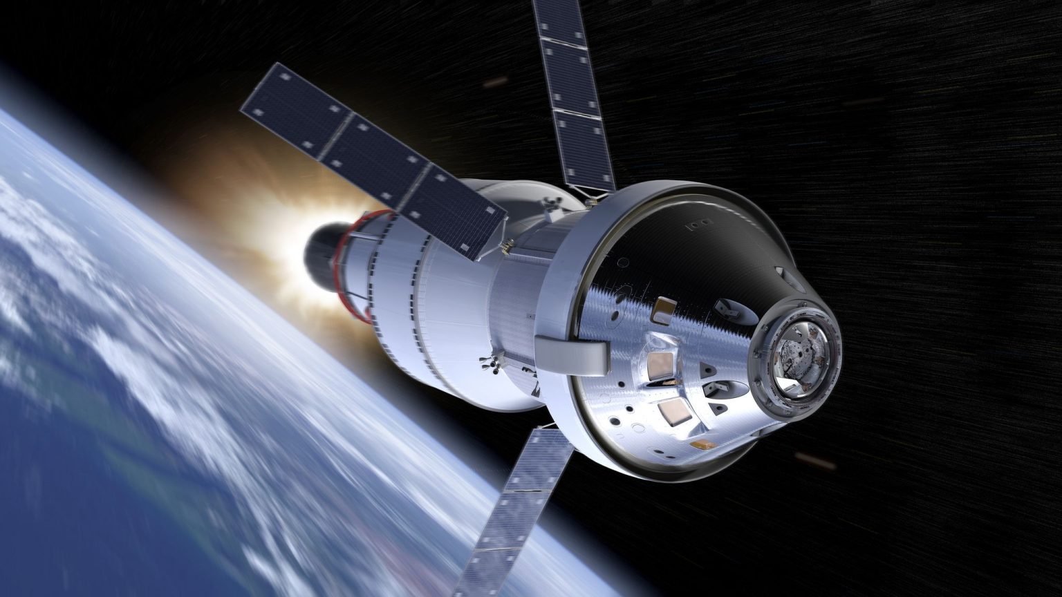 NASA Artemis II launches aboard the Space Launch System with four astronauts on a crewed lunar flyby mission.