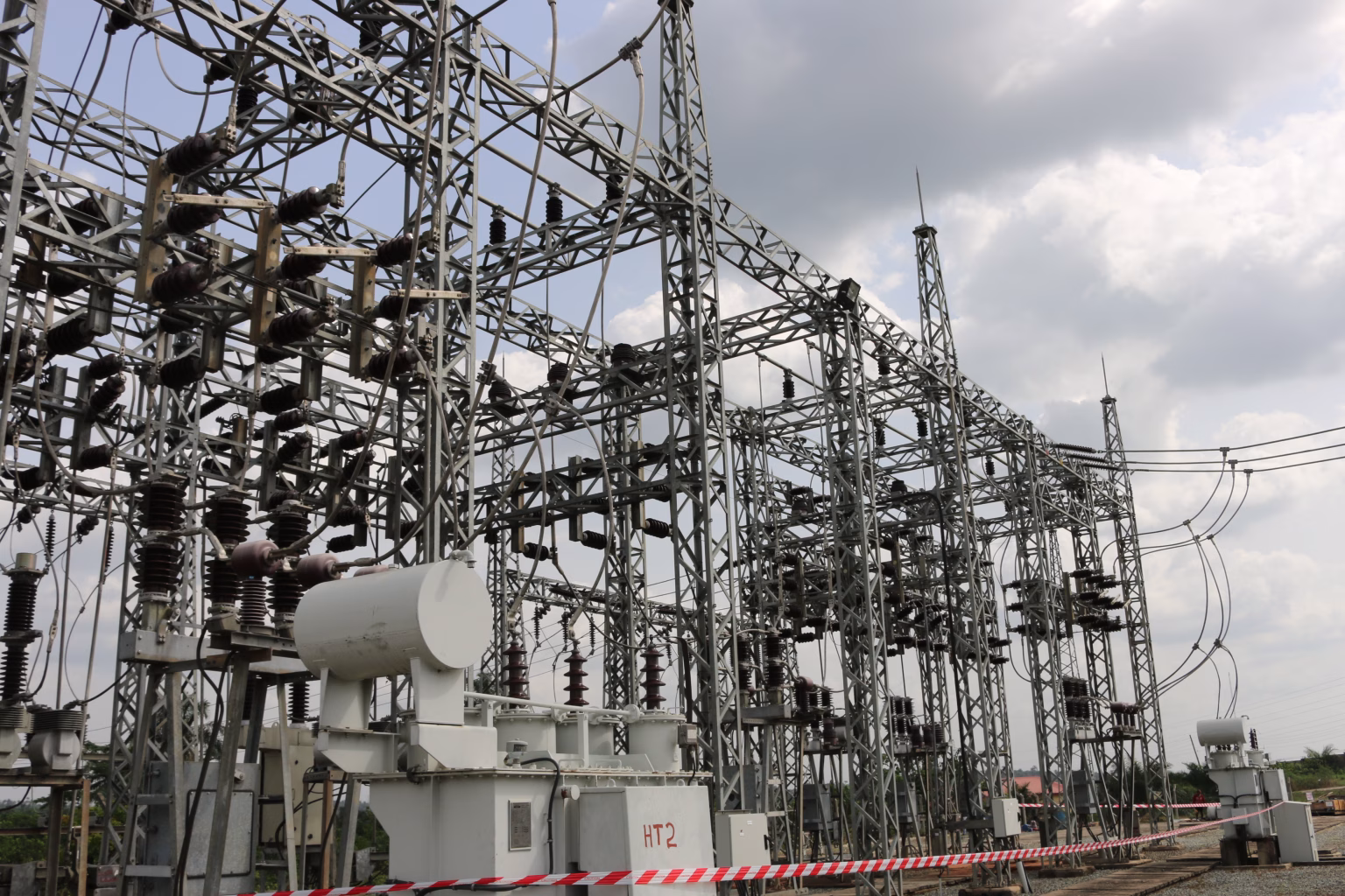 Transmission towers during planned TCN maintenance causing intermittent power outage in Uyo and nearby areas