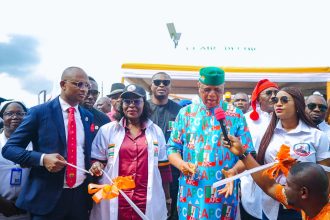 Governor Umo Eno commissioning roads, youth development centre and health centre in Oron Local Government Area of Akwa Ibom State.